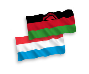 Flags of Malawi and Luxembourg on a white background