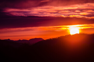 Scarlet sunset over the mountains