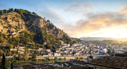 Berat, Albania. Traditional ottoman houses in old town (mangalem district) at sunrise. Listed as UNESCO world heritage site, along with river Osum bank. The city of thousand windows