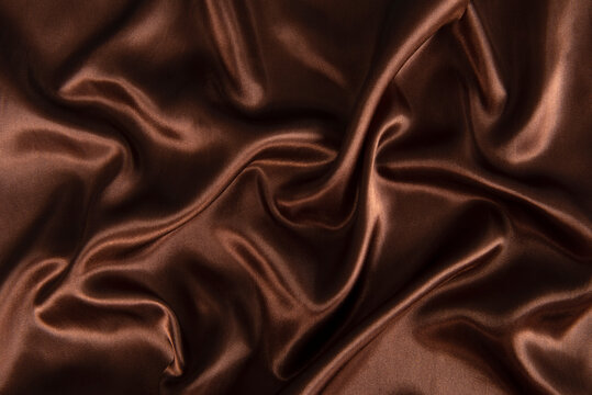 brown or chocolate silk satin fabric texture background