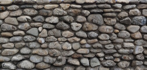 a stone wall consisting of bumpy stones