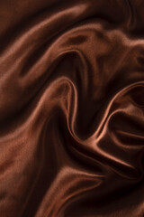 brown or chocolate silk satin fabric texture background