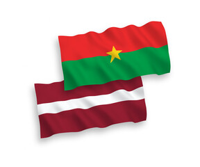 Flags of Latvia and Burkina Faso on a white background