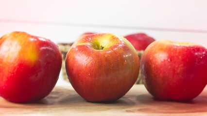 Apple put on wooden timber board,