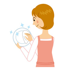 皿を拭く女性