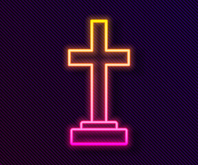 Obraz premium Glowing neon line Grave with cross icon isolated on black background. Vector