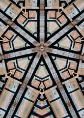 Industrial poster background, kaleidoscopic view of rusty steel construction.