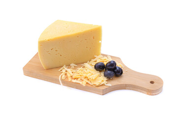 A piece of hard yellow gouda cheese and grated cheese with olives in close-up, isolated on a white background.selective focus.