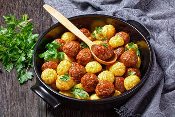 Meatballs and spaghetti balls top view, close-up
