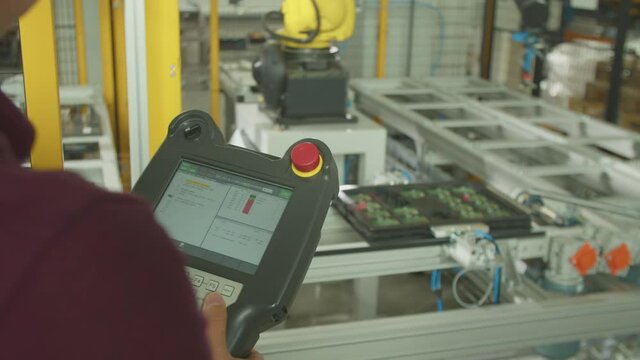 Robotic sorting system. Robotic arm robot is sorting details in smart warehouse