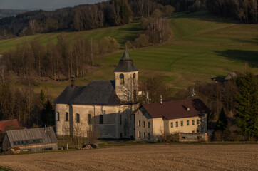 View for Roprachtice village with old church in spring nice sunny evening