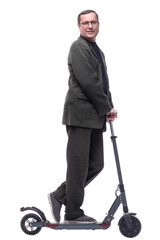 in full growth. Mature man with an electric scooter.