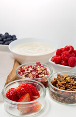 Ingredients for a healthy breakfast. Muesli, berries and yogurt. Healthy eating. Sports fitness menu. Concept. High quality photo
