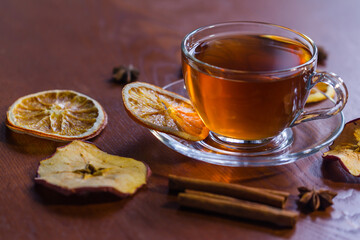 Cup of tea and slices of dried orange