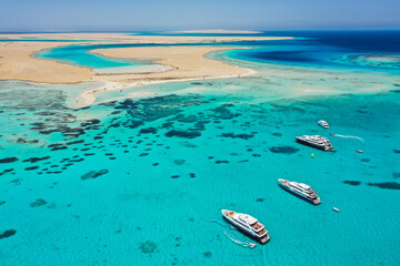 Aerial view: Luxury Yachts in front of Tawila island in the Red Sea, Egypt