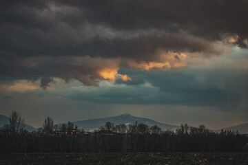Mountain Lysá hora in Czech Republic with colourful sunset sky