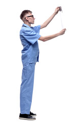 in full growth. doctor carefully looking at the x-ray .