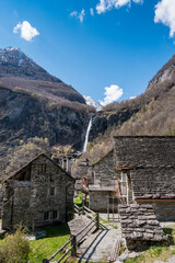 rustico stone houses in Foroglio with Cascata di Foroglio, Ticino