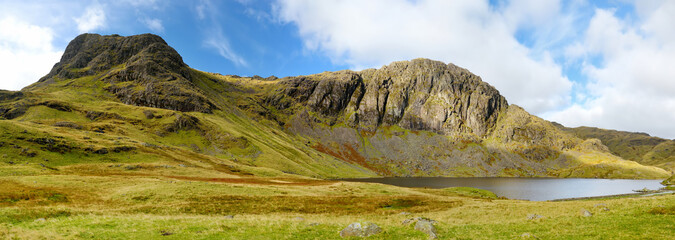 Clear waters of Stickle Tarn lake, located in the Lake District, Cumbria, UK