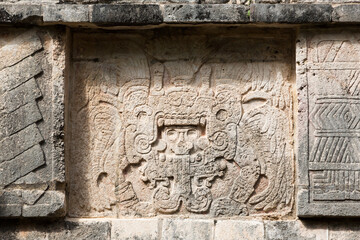 Fototapeta na wymiar Relief carving at the platform of Venus, Chichen-Itza, Yucatan, Mexico