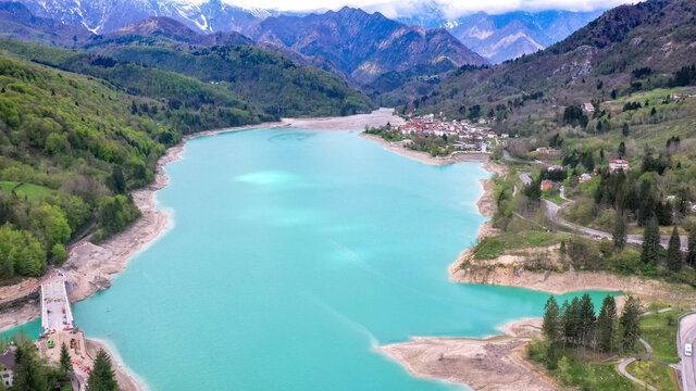 Barcis Lake in a panoramic aerial view from above during sunny day at Valcellina