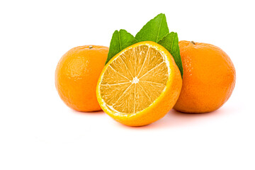 Fresh orange, cut in half and orange with green leaves. isolated on white background