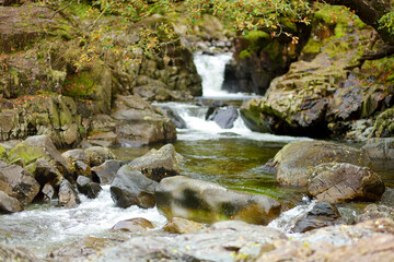 Wild waters of Stonethwaite Beck, a small river formed at the confluence of Langstrath Beck and Greenup Gill beneath Eagle Crag, Cumbria, England