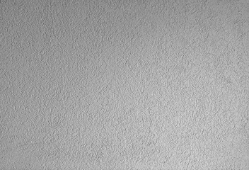 Fototapeta na wymiar Soft light on a white stucco wall.