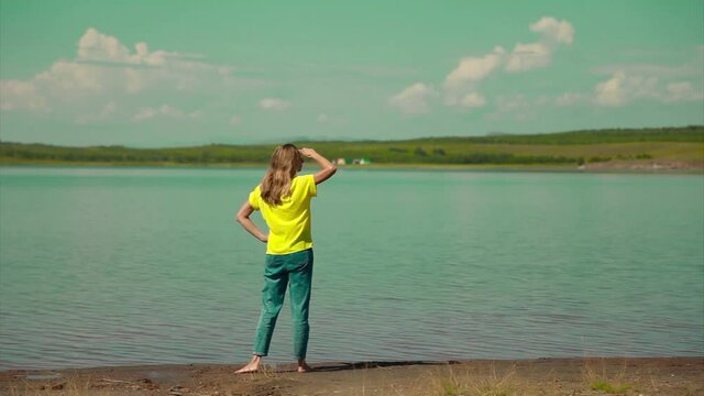girl sunbathing in the water by the river