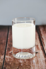 white milk drink in a glass for a kefir diet