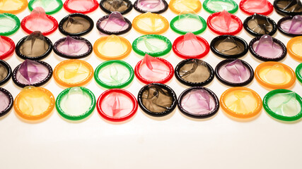 Colorful condoms background.
