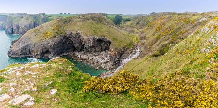 A panorama view along the Pembrokeshire coast neart to Tenby, South Wales on a sunny day