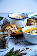 Pumpkin soup with vegetables and bread