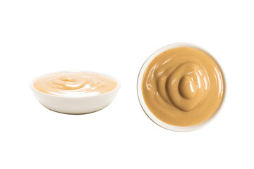 Mushroom sauce in a bowl isolated on white background.