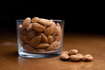 Almonds in clear glass on a table