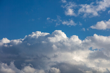 Naklejka na ściany i meble Clouds on blue sky background, abstract cloudscape