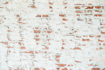 Vintage Wall With Peeled Plaster. Retro Grunge Wall. Brick Wall With White Uneven Stucco