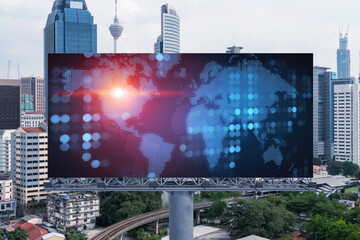 World planet Earth map hologram on billboard over panorama city view of Kuala Lumpur, Malaysia, Asia. The concept of international connections and business.