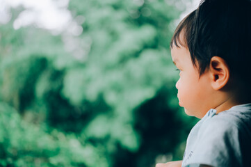 Portrait of upset little boy, Kid sad face, Unhappy child looking out, Emotion portrait of toddler,