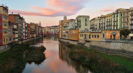Naklejka na ściany i meble girona city and river at sunset landscape 