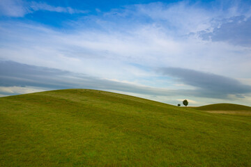 Fototapeta premium Golf course with blue sky background.