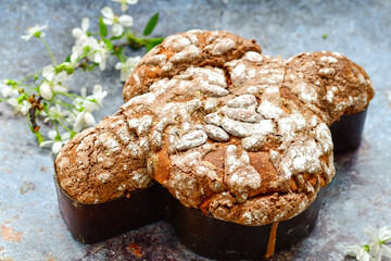 Easter hand painted eggs, and    Traditional italian easter  dove  bread cake The counterpart of the two well-known Italian Christmas desserts, panettone and pandoro.