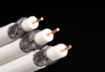 Coaxial tv cable isolated on black background. selective focus