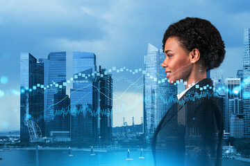 Attractive black woman trader and stock market analyst in suit dreaming about market behavior and...