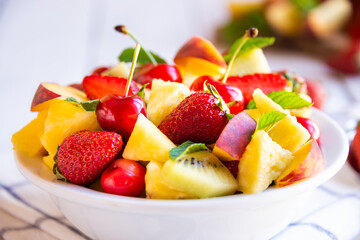 Fresh fruit salad with strawberries and cherries