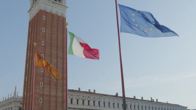 Three Flags with St Mark's Campanile Venice, Italy.(San Marco,Venezia,Italia) 4k
