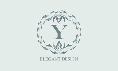 Elegant floral monogram with exquisite elements. Template for invitations, labels, business signs. Vintage ornament with calligraphic letter Y.