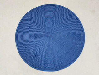 Fototapeta na wymiar Blue Circular natural brown rattan fibers craft on white wall background