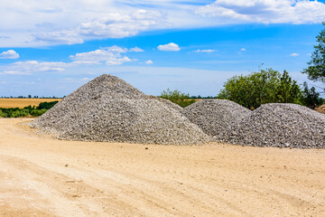 Big piles of rubble near the roadside