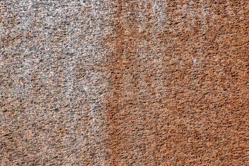 Gray rough concrete surface with a rusty tinge